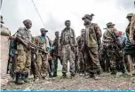  ?? —AFP ?? ARKAY: Members of the Amhara militia gather in the village of Adi Arkay, 180 kilometers northeast from the city of Gondar, Ethiopia.