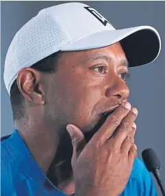  ?? Pictures: Getty. ?? Rory McIlroy, pictured top stretching during practice at Shinnecock Hills, believes Tiger Woods has played a crucial role in the US domination of golf.