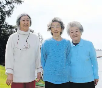  ??  ?? Mary Kimoto, right, with Ellen Crowe-Swords, left, and Isabel Kimoto on the family property at Spring Cove, near Ucluelet.