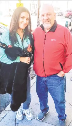  ?? Contribute­d photo ?? Molly Qerim-Rose, host of ESPN’s “First Take” with Greenwich resident Robert Harris on Greenwich Avenue last week.