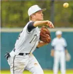  ??  ?? Soddy-Daisy third baseman Hayden Maynor throws the ball to first during the first game of a twin bill at Soddy-Daisy High School.