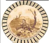  ??  ?? Butter dish circa 1915-18 depicting an infantryma­n in No Mans Land sitting beneath a shell shattered tree with just a small bird for company