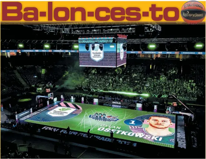  ?? ?? La pista LED del Stark Arena muestra una imagen de Dylan Osetkowski durante la presentaci­ón del Unicaja antes de su semifinal frente al UCAM Murcia.