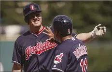  ?? AP photo ?? Cleveland’s Jay Bruce celebrates with Jose Ramirez after hitting a three-run homer in the first inning Wednesday.