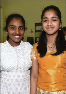  ??  ?? Dalin Sagy and Catherin Maria Joshy at the Indian festival in Tullyallen parish hall.