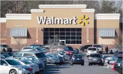  ??  ?? LANDOVER: This file photo taken on December 31, 2014 shows a Walmart store in Landover, Maryland. Wal-Mart Stores yesterday. —AFP