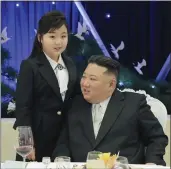  ?? KOREAN CENTRAL NEWS AGENCY/KOREA NEWS SERVICE VIA AP ?? North Korean leader Kim Jong Un and his daughter attend a feast to mark the 75th founding anniversar­y of the Korean People's Army in North Korea on Tuesday.