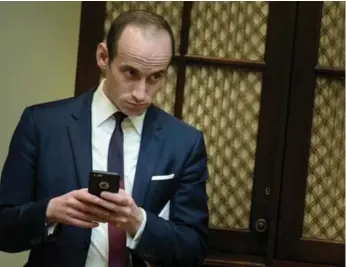 ?? BRENDAN SMIALOWSKI/AFP/GETTY IMAGES ?? Adviser Stephen Miller’s strange use of the language must fit right in with the president’s spelling ideals.