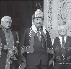  ?? CNW ?? Leaders of the Nisga’a Tribal Council including Rod Robinson, left, President Joseph Gosnell and Frank Calder, who initiated the Nisga’a legal struggle in Ottawa in 1961, prepare to enter the Parliament building in Ottawa to hear the 1999 Speech from...