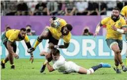  ?? Picture: EDGAR SU/REUTERS ?? VINTAGE BEST: Australia’s Marika Koroibete in action against England in the World Cup in Japan in 2019. He was awarded the John Eales Medal as Australia’s best Test player for the second time this week