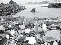  ?? The New York Times/MARCUS ERIKSEN ?? Plastic debris covers a beach in the Azores, Portugal, in this undated photo.