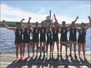  ?? Yale Athletics ?? Members of the Yale first varsity crew celebrate their win over rival Harvard in the annual Regatta on Saturday.