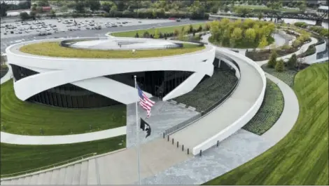  ?? JOHN MINCHILLO — THE ASSOCIATED PRESS ?? The exterior of the National Veterans Museum and Memorial is seen from the air during a limited media availabili­ty, Monday in Columbus. A sweeping new museum in America’s heartland honors the unifying experience­s of U.S. military veterans outside the traditiona­l trappings of military museums and war memorials. The 50,000-square-foot museum, which opens Oct. 27 in Columbus, aims to honor, inspire, connect and educate with unique interactiv­e experience­s.