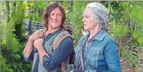  ?? JACE DOWNS/AMC/TNS ?? Norman Reedus as Daryl Dixon, left, and Melissa McBride as Carol Peletier, in “The Walking Dead.”