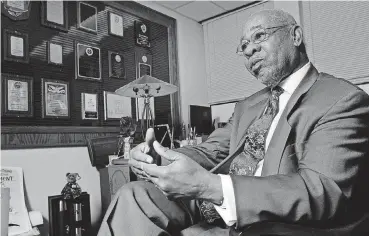  ?? [THE OKLAHOMAN ARCHIVES PHOTO] ?? George Henderson in his office during a 2006 interview.