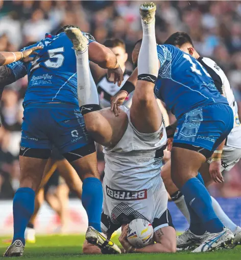  ?? Picture: AFP ?? Samoa’s Junior Paulo (right) escaped a ban for this tackle on England’s Tom Burgess in the semi-final.