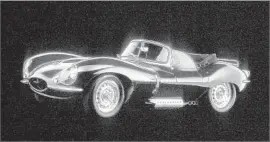  ?? Scott Williamson Petersen Automotove Museum ?? THE 1957 JAGUAR XKSS is “a real prize,” said a car collector who helped to acquire a Steve McQueen-owned model for the Petersen Automotive Museum.