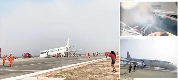  ??  ?? Nose down: (Clockwise) A passenger recording the scene on her phone as firefighte­rs respond to the emergency, smoke entering the cabin as the plane landed and firefighte­rs hosing it down as a precaution in Mandalay. — Reuters/AP