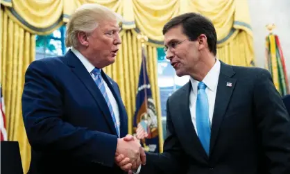  ?? Photograph: Michael Reynolds/EPA ?? Donald Trump attends the swearing-in of Mark Esper as US secretary of defense.