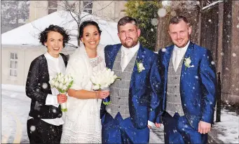 ??  ?? Bride and groom Mia Bronotte and Davey Walsh pose for a snap in the snow with Mia’s sister Alinta and best man Trevor Sheehan.