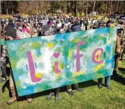  ?? STEVE SCHAEFER/STEVE.SCHAEFER@AJC.COM ?? Activists kick of what they say will be a week of protests and festivitie­s in opposition to the Public Safety Training Center project planned for the wooded Dekalb County property.