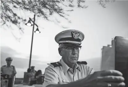  ?? NICK OZA/THE REPUBLIC ?? Roger Ellis from the U.S. Coast Guard Auxiliary came to perform to honor 9/11 victims and soldiers who sacrificed their lives to protect our country during the Tempe Healing Fields memorial ceremony at 80 West Rio Salado in Tempe.