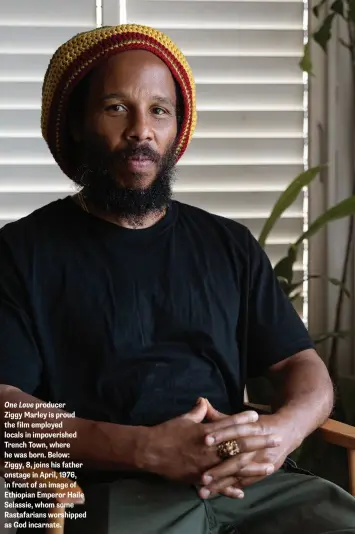  ?? ?? One Love producer
Ziggy Marley is proud the film employed locals in impoverish­ed Trench Town, where he was born. Below: Ziggy, 8, joins his father onstage in April, 1976, in front of an image of Ethiopian Emperor Haile Selassie, whom some Rastafaria­ns worshipped as God incarnate.