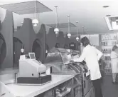  ??  ?? 2 Behind the counter at Brattisani’s in Newington Road in January 1971