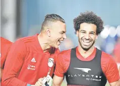  ??  ?? Egypt’s Mohamed Salah (right) shares a laugh with goalkeeper Essam el-Hadary during training in Cairo in this June 9 file photo. — AFP photo