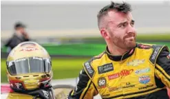  ?? AP PHOTO/JOHN RAOUX ?? Austin Dillon looks up at the leaderboar­d during Sunday’s qualifying for the Daytona 500 at Daytona Internatio­nal Speedway. Dillon’s car chief was ejected for repeated inspection failures before qualifying for the race.