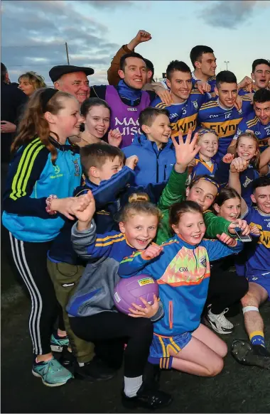  ?? Picture: Sportsfile ?? Ratoath players and supporters celebrate after last year’s Senior Championsh­ip triumph in Pairc Tailteann.