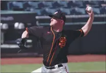  ?? CARMEN MANDATO — GETTY IMAGES ?? Jake McGee also pitched one hitless inning with one strikeout for the Giants in Thursday’s spring training game at Scottsdale, Arizona.