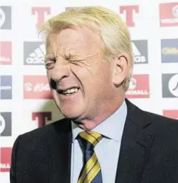  ??  ?? FACING UP TO THE CHALLENGE: Gordon Strachan in expressive mood as he announces his squad at Hampden yesterday