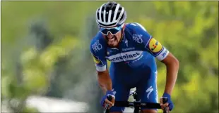  ?? Ap-christophe Ena ?? France’s Julian Alaphilipp­e rides to the finish line to win the third stage of the Tour de France cycling race over 133.6 miles with start in Binche and finish in Epernay on Monday.