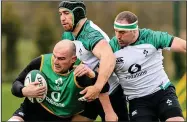  ??  ?? READY FOR ACTION: Rhys Ruddock (left), Ultan
Dillane (centre) and Rob Herring in training