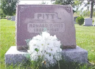  ??  ?? This monument in a Morrisburg cemetery marks the grave of former police officer Ronald Pitt, who was gunned down in 1957.