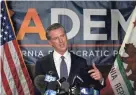  ?? PEDRONCELL­I/AP FILE RICH ?? California Gov. Gavin Newsom has pledged to empower citizens to enforce a ban on the manufactur­e and sale of assault weapons.