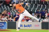  ?? ERIC CHRISTIAN SMITH/ASSOCIATED PRESS ?? Houston third baseman Alex Bregman throws out Oakland Athletics’ Ramon Laureano during action April 9. Bregman has been placed on the COVID-related injured list.