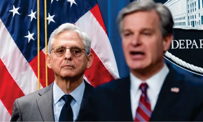  ?? Photograph: Jim Lo Scalzo/EPA ?? Merrick Garland with FBI chief Chris Wray. ‘This was an egregious attempt by PRC intelligen­ce officers to shield a PRC-based company from accountabi­lity,’ Garland said.