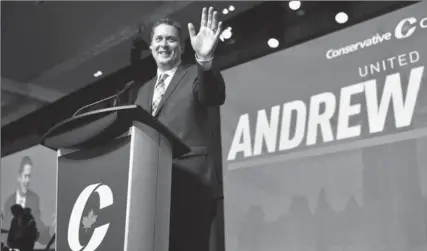  ?? FRANK GUNN, THE CANADIAN PRESS ?? Andrew Scheer speaks after being elected the new leader of the federal Conservati­ve party in Toronto on Saturday.