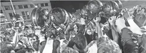  ?? WADE PAYNE / FOR THE TENNESSEAN ?? Ravenwood players celebrate after defeating Brentwood Friday, Nov. 22, 2019, in Brentwood, Tenn.