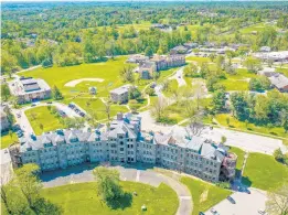  ?? JERRY JACKSON/ BALTIMORE SUN ?? The Maryland Board of Public Works has approved the sale of the Spring Grove Hospital Center’s 175-acre campus in Catonsvill­e to the University of Maryland, Baltimore County for a nominal $1.