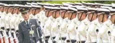  ??  ?? TOKYO: Japan Self-Defense Force honor guards make a line prior to a welcoming ceremony for Japan’s Prime Minister Shinzo Abe at the Defense Ministry in Tokyo.—AFP