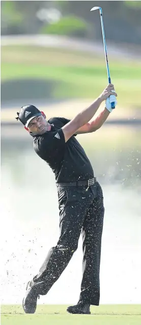  ??  ?? BLACK TO GREEN: Sergio Garcia in action in Portugal yesterday