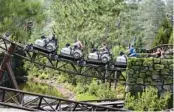  ?? PATRICK CONNOLLY/ORLANDO SENTINEL ?? Islands of Adventure visitors brave Hagrid’s Magical Creatures Motorbike Adventure, a roller coaster at the Wizarding World of Harry Potter.