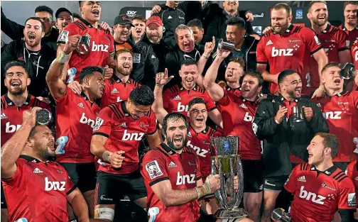  ?? PHOTOSPORT/GETTY IMAGES ?? Ma’a Nonu and Sonny Bill Williams have been reunited at the Blues. The Crusaders celebrate their 2018 Super Rugby triumph. The Christchur­ch-based franchise will again be the team the others have to beat when next season’s competitio­n begins.