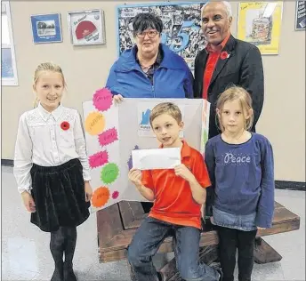  ?? ROSALIE MACEACHERN PHOTO ?? Will Cullen, centre, convinced 100 Kids Who Care Pictou County to donate $350 to Viola’s Place Society which was gratefully accepted by society president Karen MacPhee and vice-president Brian Bowden. With Will are, left, Lauren Campbell and right,...