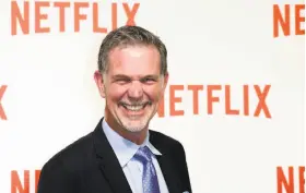  ?? Jacques Brinon / Associated Press 2014 ?? Netflix CEO Reed Hastings said the company’s investment­s in original content were paying off and added that they would rise further in the years to come.