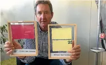  ??  ?? NZ Merino chief executive John Brakenridg­e with a sample of merino fabric, bottom left, which has completely degraded after nine months’ burial, compared to synthetic, right, which has failed to break down at all.