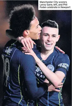  ??  ?? Manchester City scorers Leroy Sane, left, and Phil Foden celebrate in Newport